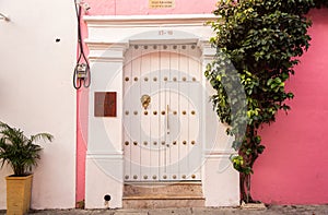 Cartagena`s elaborate door knockers date back to colonial times. There is a history behind each door. photo